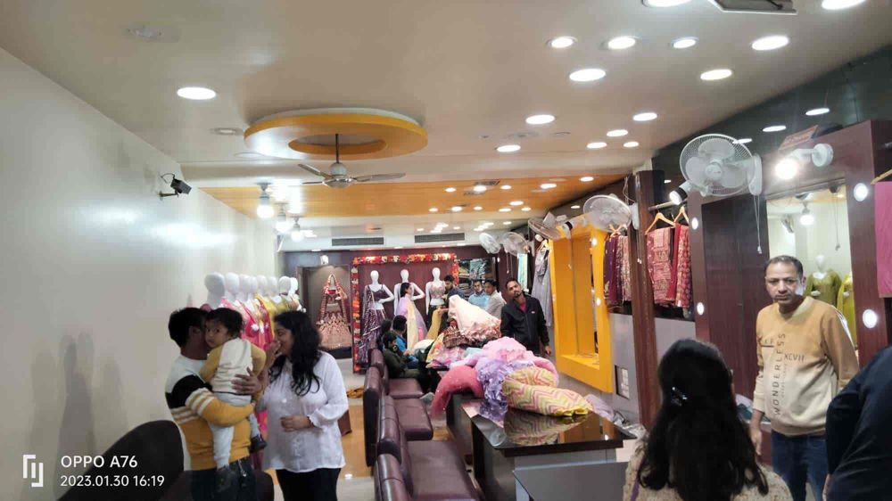 Shoppers browsing the Hello Beauty showroom floor